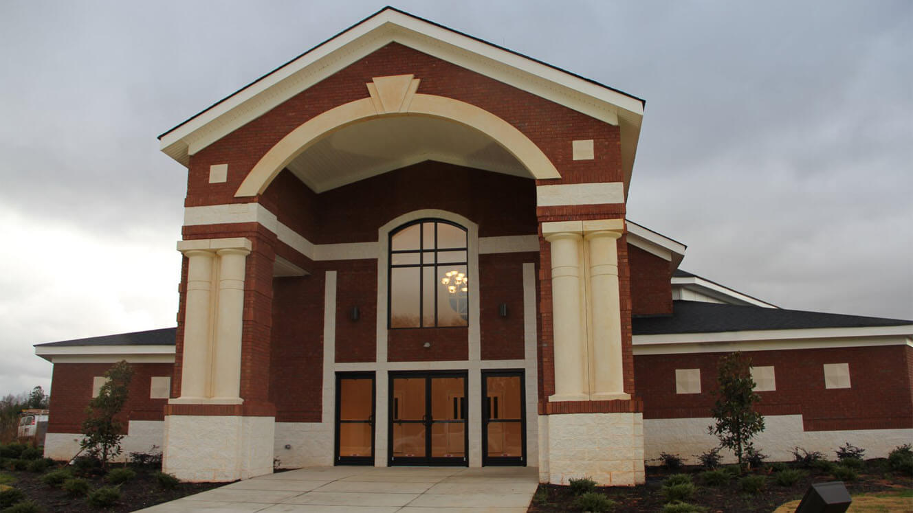 Church New Hope Exterior with Arched Entryway