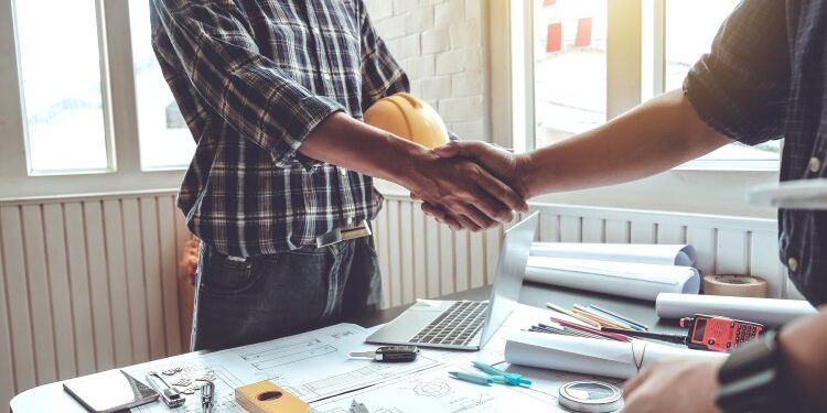 Engineer and contractor shaking hands success of the project wor contractor handshake