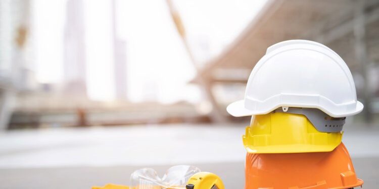 yellow and white hard safety wear helmet hat in the project at c hardhats